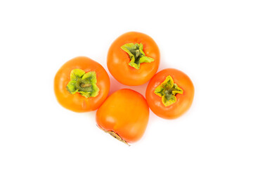 Persimmon isolated on white background. Persimmon fruit. Slice of ripe, juicy, sweet persimmon fruit. Vegan. Fruit garden. Close-up.