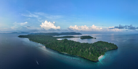 The scenic island of Bangka, just north of Sulawesi in Indonesia, is fringed by healthy coral reefs and mangroves. This area is part of the Coral Triangle and harbors astounding marine biodiversity.