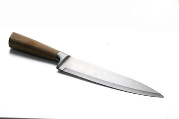 Crafted precision shines in a chef\'s knife showcasing elegance and functionality. 