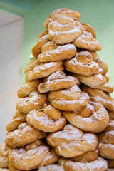 pyramid of typical ensaimadas from Mallorca in an artisanal bakery, Arta, Mallorca, Balearic Islands, Spain