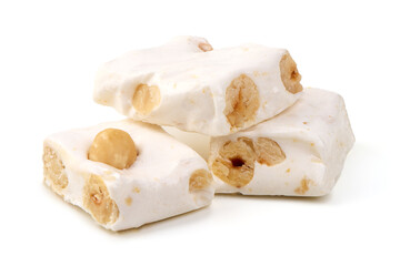 White nougat bar with hazelnuts, packaged, isolated on white background.