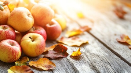 Fresh Fruits on Wooden Table with Autumn Leaves
