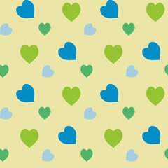 Seamless pattern with magic green and blue hearts on light yellow background. Vector image.