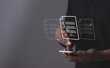 Young man with smartphone mobile hand using a pen touching to sign a Online Business Contract, Contract signing, Electronic signature, Digital documents, Future smart contract