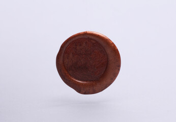 Brown sealing wax on white background