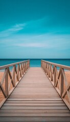 Obraz premium Wooden Boardwalk Leading to Tranquil Turquoise Ocean, Sandy Beach, Summer Vacation Concept
