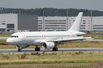 Modern White Passenger Plane performing a rejected takeoff test at Assembly Facility