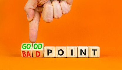Good or bad point symbol. Concept words Good point Bad point on beautiful wooden blocks. Beautiful orange table orange background. Businessman hand. Business good bad point concept. Copy space