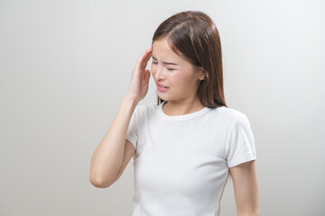 Dizzy asian young woman, girl headache or migraine pain suffering from vertigo while sitting on...