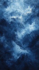 Fototapeta premium Abstract blue smoke texture swirling against a dark background, perfect for artistic designs, atmospheric themes, and moody wallpapers.