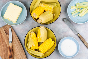 Steamed sweetcorn serve on plate.