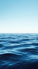 Obraz premium Serene Ocean Waves Under a Clear Blue Sky