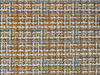 Close up of random white, black, and yellow fabric in small pixels and checkerboard pattern