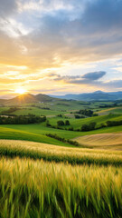 Fototapeta premium Breathtaking sunset over lush green fields and rolling hills
