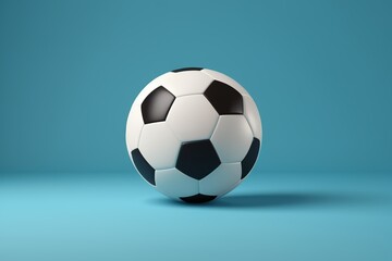 Naklejka premium a close up of a soccer ball on a blue surface