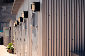 Obraz premium abstract view of an outdoor public building with industrial looking light in summer