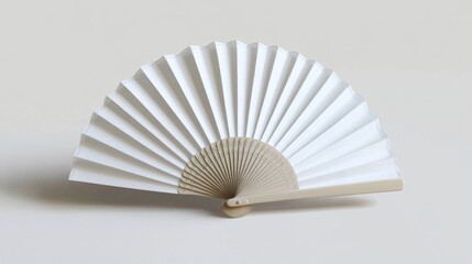 Minimalist design featuring a white hand fan. 
