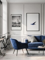 Grey armchair and blue sofa in spacious living room interior with posters and bicycle. Real photo