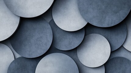 Abstract composition of overlapping circular shapes in shades of blue and gray.