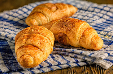 Freshly Baked Croissants on Checkered Cloth