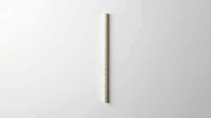 a single striped drinking straw on a white background