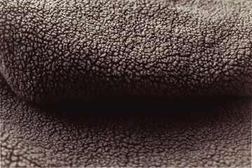 Color of the Year 2025 Mocha Mousse color. Chocolate or Brown Background. Close-Up of Brown Textured Wool Surface with Dense Abstract Patterns