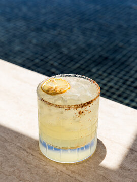 Mezcal Margarita in a pool setting 