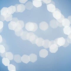 bokeh blue of  Soft white bokeh lights on light blue background  abstract bokeh light background bright   emotional harmonious vignette 