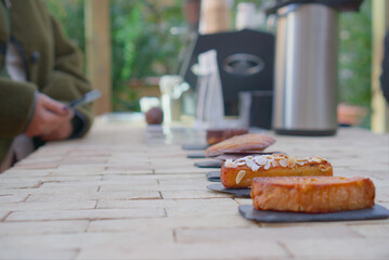 Selection of Gourmet Pastries on Display at Outdoor Café