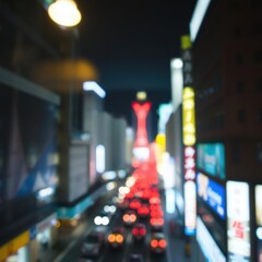 Fototapeta premium Blurry cityscape at night, neon lights, red tail lights, busy street, urban landscape, bokeh effect, downtown atmosphere, tall buildings, glowing signs, vibrant colors, long exposure, motion blur, cin