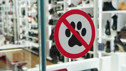A sign indicating that pets are not allowed in the retail store, presented in highquality 4K footage