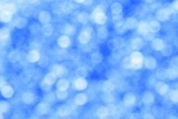 winter holiday backdrop: close up of blue bokeh circles