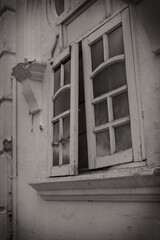 Old Open Window on Weathered Wall