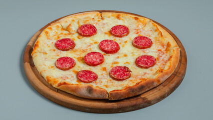 Pizza pepperoni on tray isolated