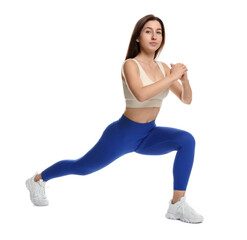 Woman in sportswear exercising on white background