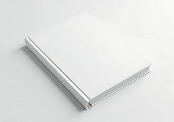 Naklejka premium blank white hardcover book sits alone pristine white