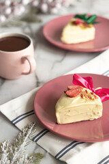 Delicious and Festive Dessert alongside Coffee beautifully arranged on a Marble Table