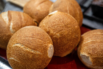 Home baked wheat rolls. Breeds with fluffy crumb and golden crust for sandwiches.