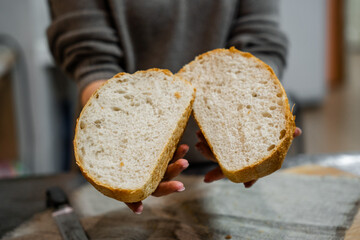 Round homemade delicious bread cut in half