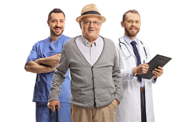 Doctors with an elderly male patient