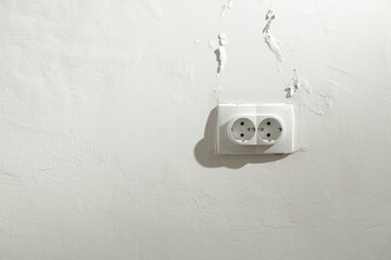 Saltpeter or mold on the wall, Closeup of wall stained with water infiltration. Potassium nitrate,...