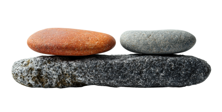 Set of smooth stones balanced on flat rock, natural harmony concept for spa, meditation, and relaxation themes isolated on transparent background