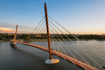 Golden Boorloo Bridge at sunset across the Swan River in Perth, Western Australia