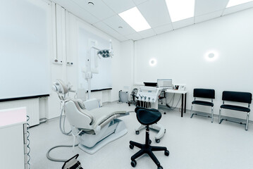Interior of dental office hospital, bright room with medical equipment chair