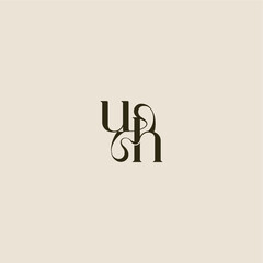 luxurious concept UH dynamic line monogram logo letter elegant wedding