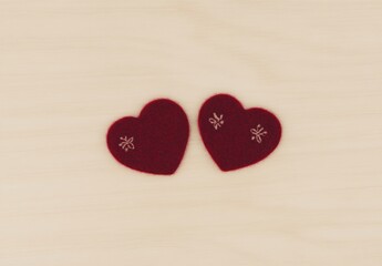 Fototapeta premium Two Red Felt Hearts on Wooden Background Valentines Day
