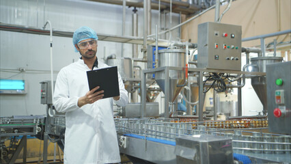 Production control supervisor inspects and controls the operation of each step in the production...