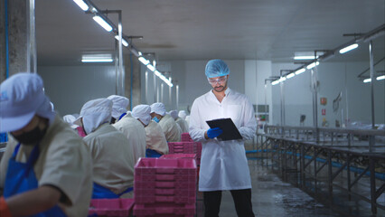 Production control supervisor inspects and controls the operation of each step in the production...
