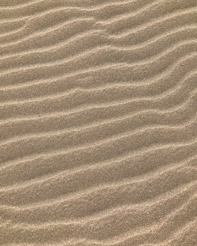 Close-Up of Sand Waves on a Beach
