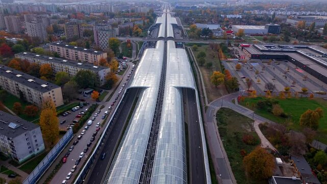 Aerial wide view, city overhead glass structure, industrial zone, Autumn